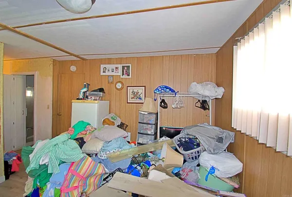 a bed room with a bed and a table