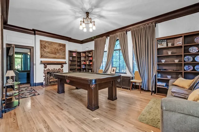 a bedroom with a bed and cabinet