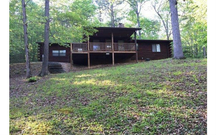 125 Ruffled Grouse Road Murphy, NC 28906 - Photo 1 of 1 a backyard of a house with seating space