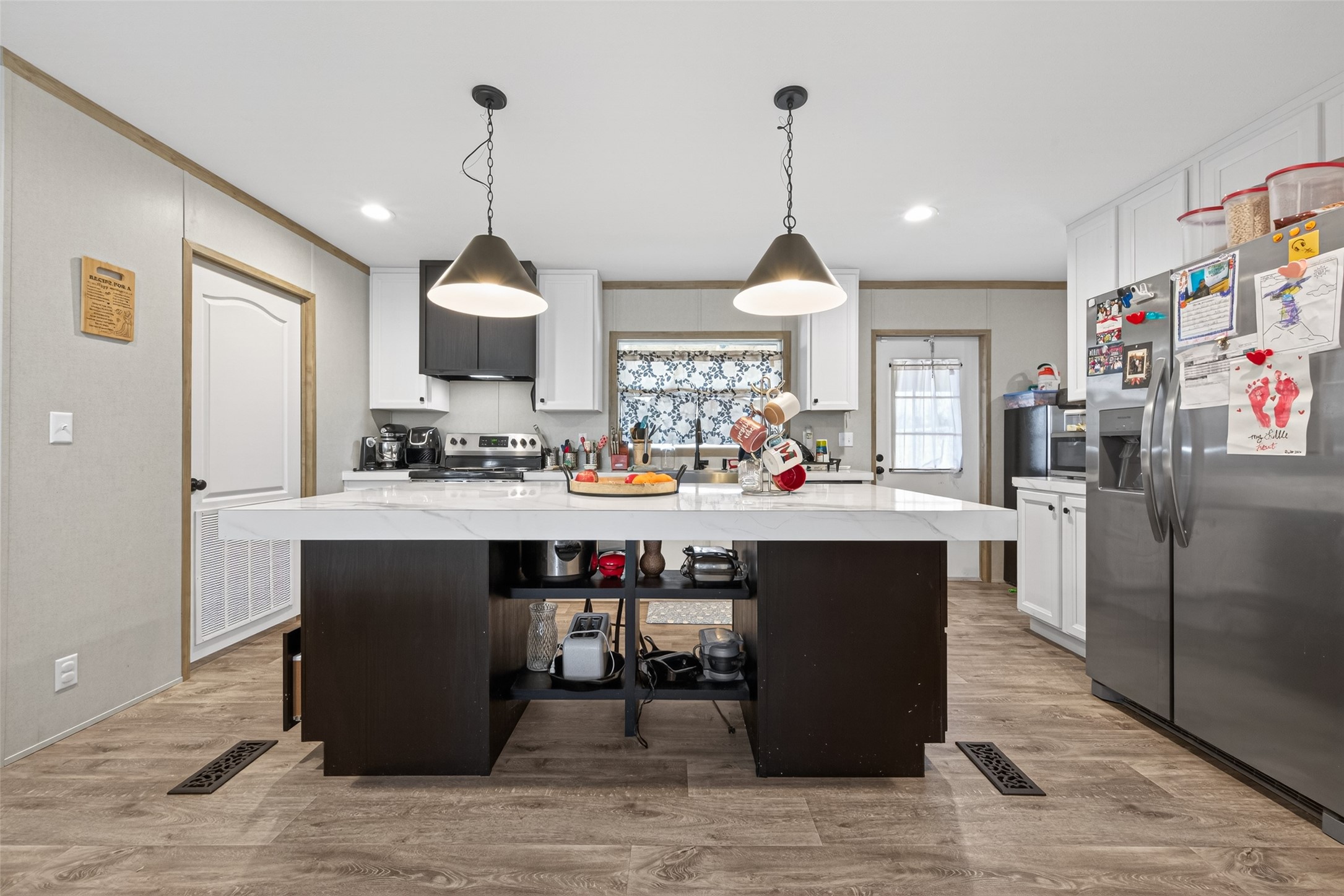 1375 Road 5735 Cleveland, TX 77327 - Photo 12 of 49 a kitchen with a sink cabinets and window