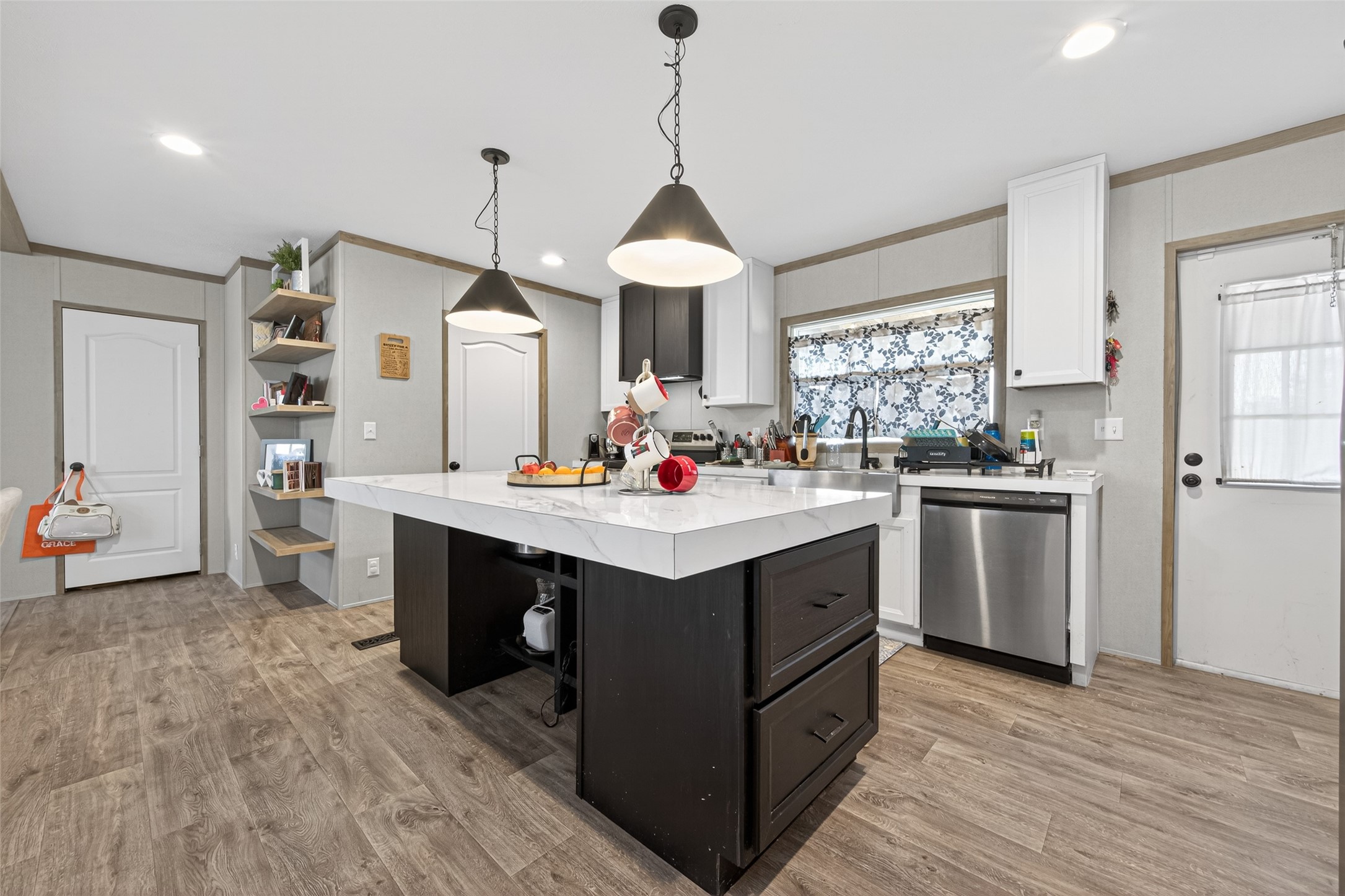 1375 Road 5735 Cleveland, TX 77327 - Photo 13 of 49 a kitchen with sink stove and cabinets