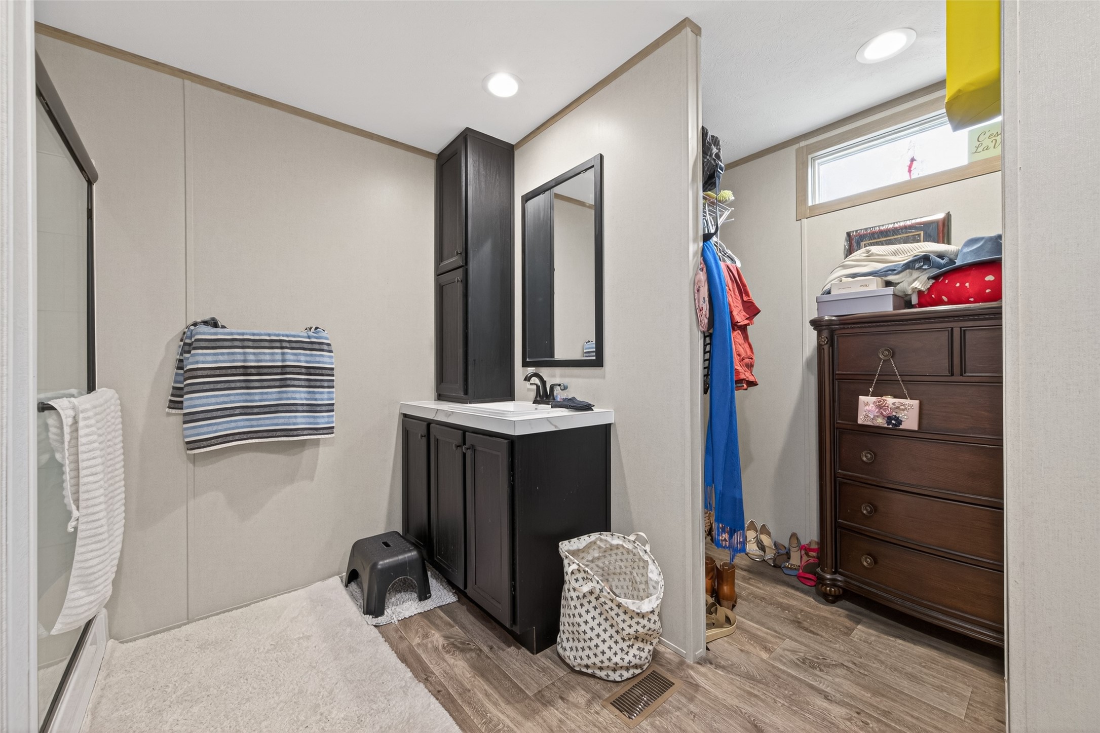 1375 Road 5735 Cleveland, TX 77327 - Photo 21 of 49 a view of walk in closet with clothes and shoes