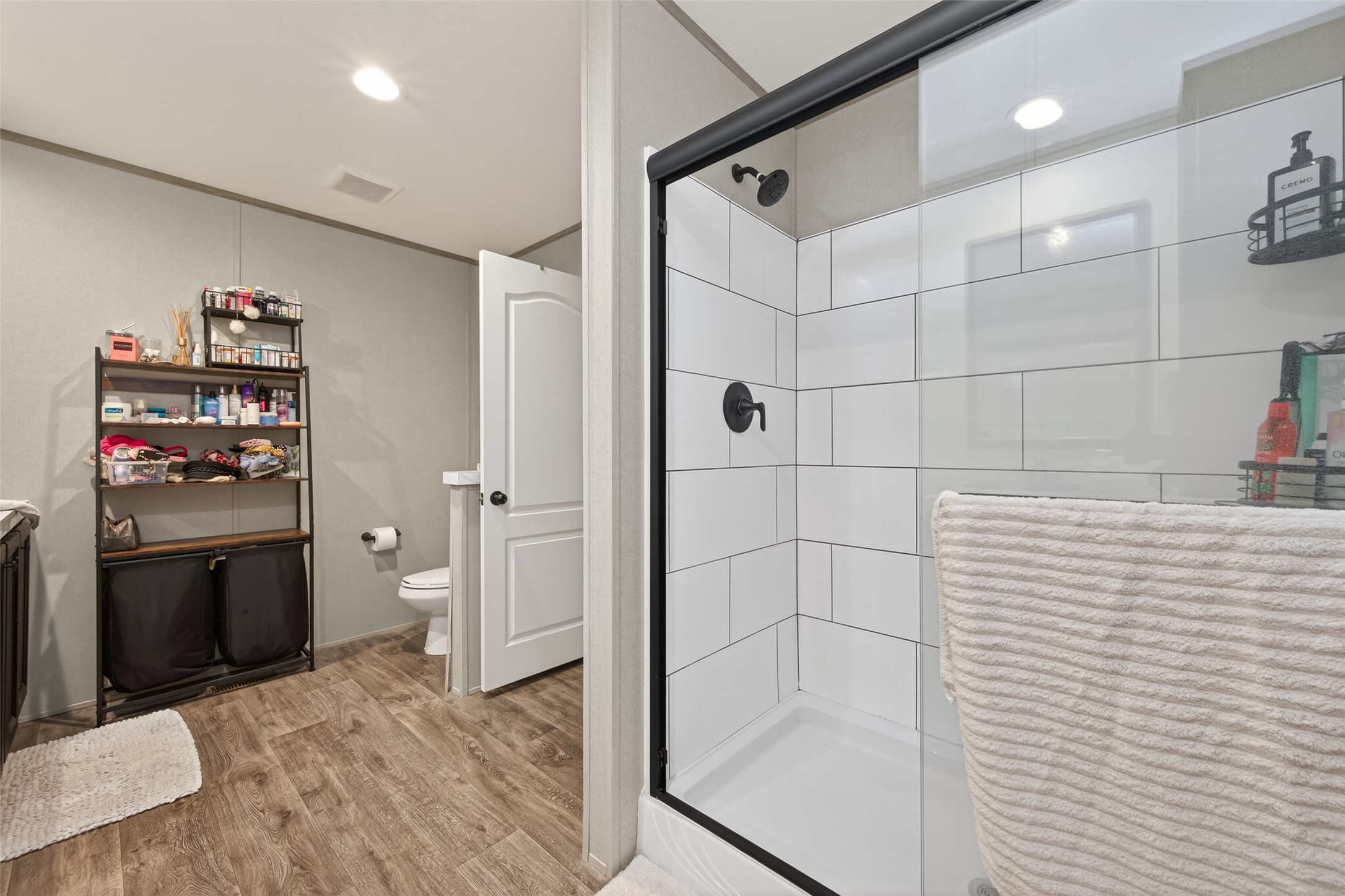 1375 Road 5735 Cleveland, TX 77327 - Photo 23 of 49 a bathroom with a bathtub and a toilet