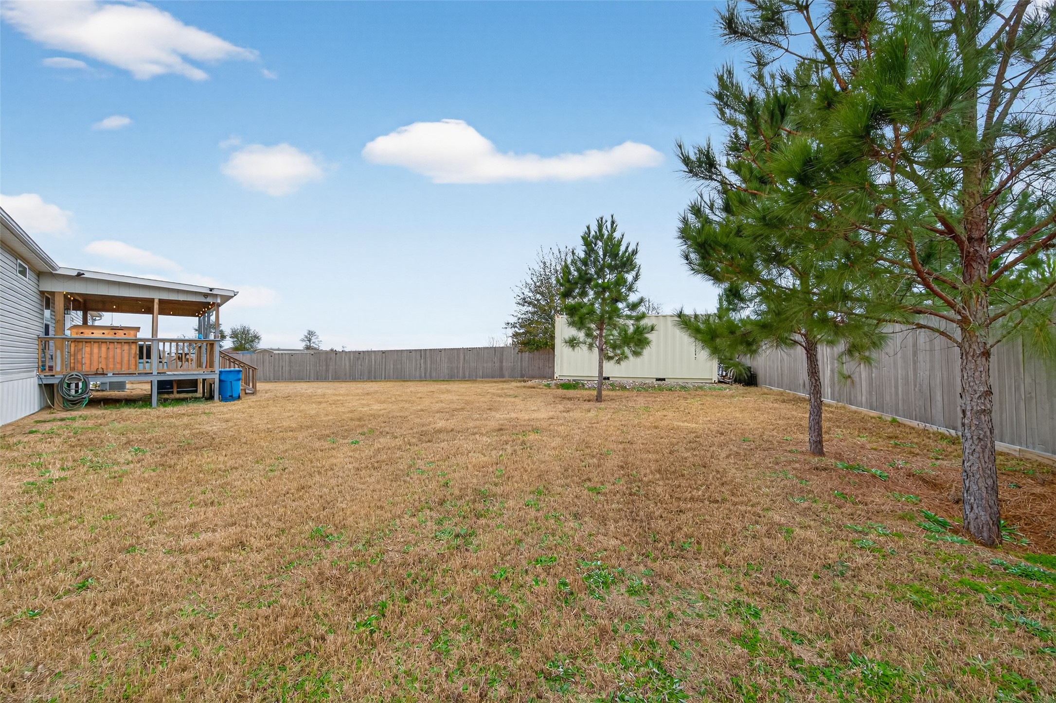 1375 Road 5735 Cleveland, TX 77327 - Photo 41 of 49 a view of a house with a yard