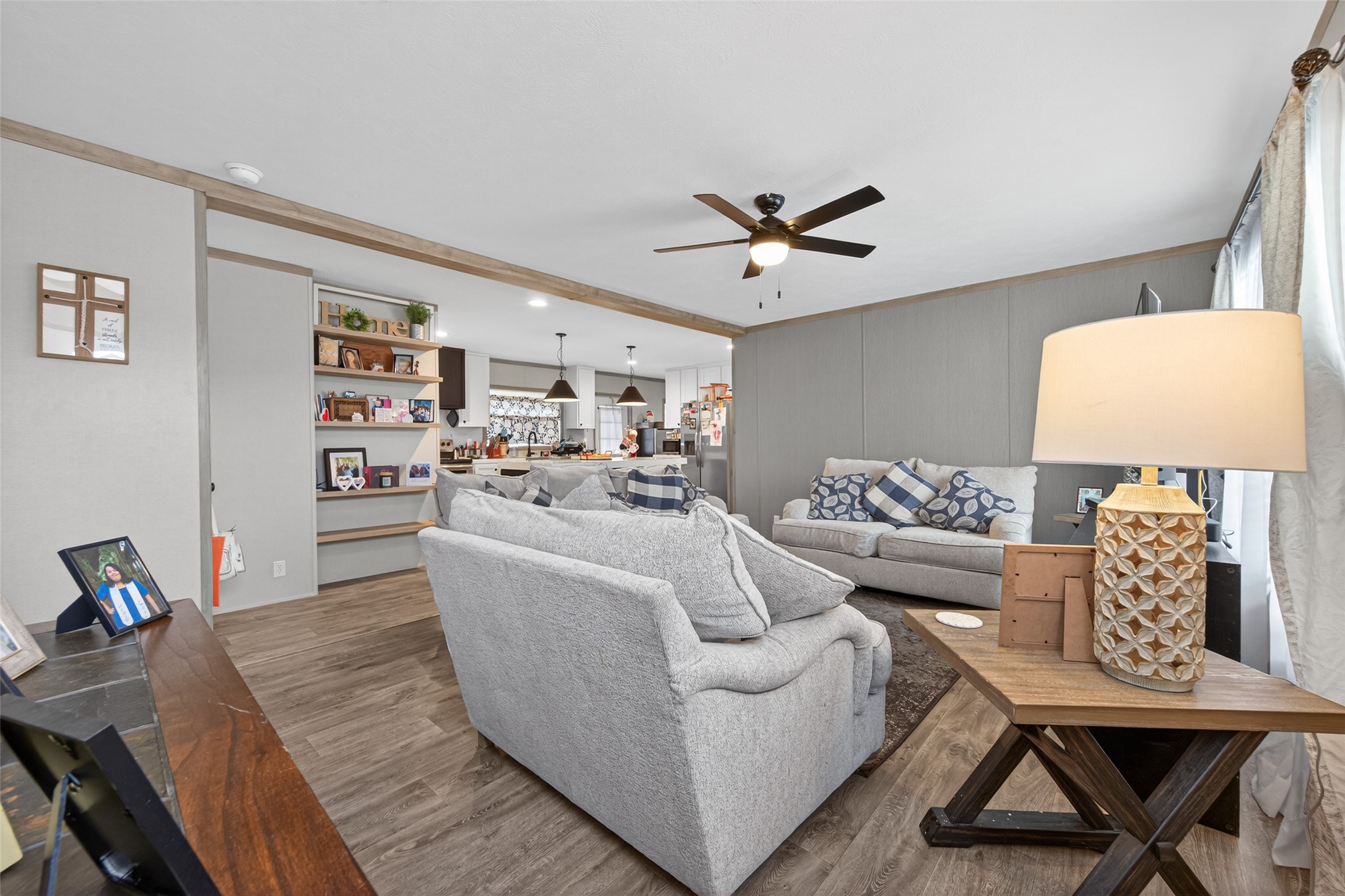 1375 Road 5735 Cleveland, TX 77327 - Photo 7 of 49 a living room with furniture and a wooden floor