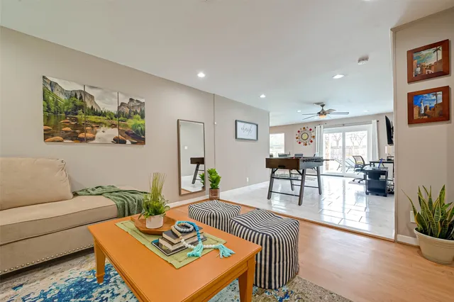a living room with furniture and a table