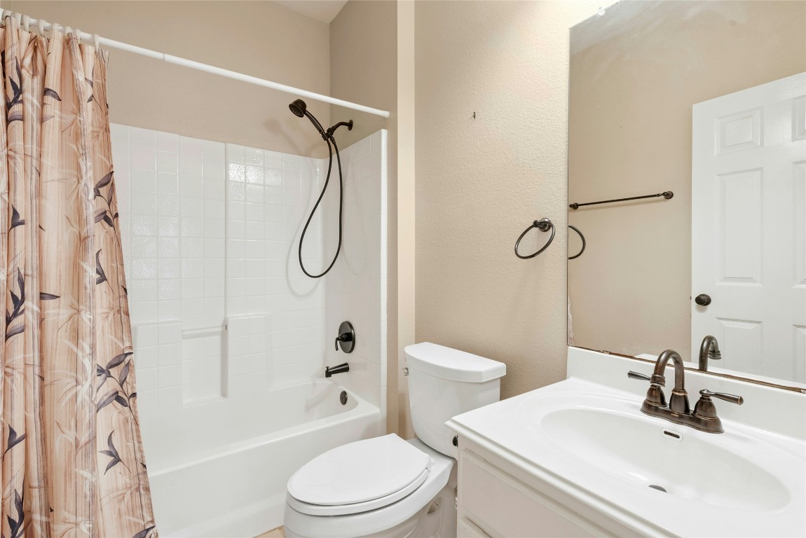 7500 Shadowridge Run, Unit 34 Austin, TX 78749 - Photo 26 of 39 a bathroom with a sink toilet and shower