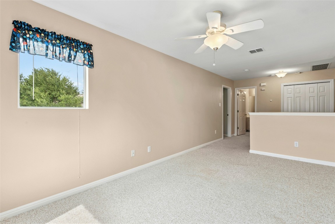 7500 Shadowridge Run, Unit 34 Austin, TX 78749 - Photo 31 of 39 a view of an empty room with a window