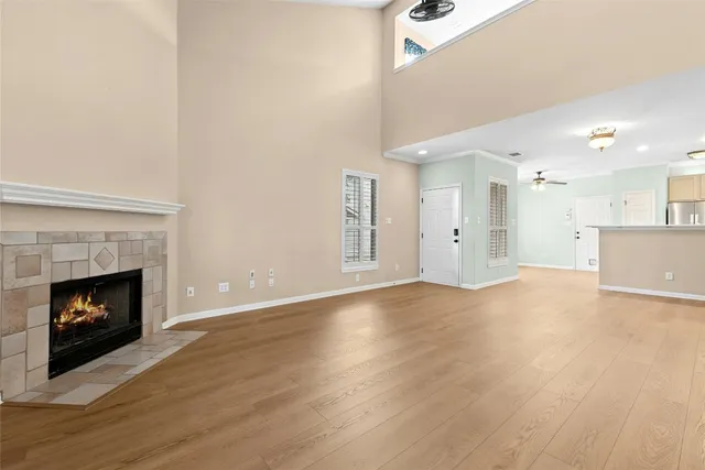 a view of kitchen with wooden floor and window