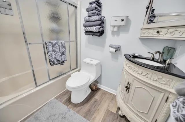 a bathroom with a toilet and a sink