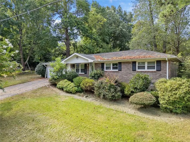 a view of a house with swimming pool