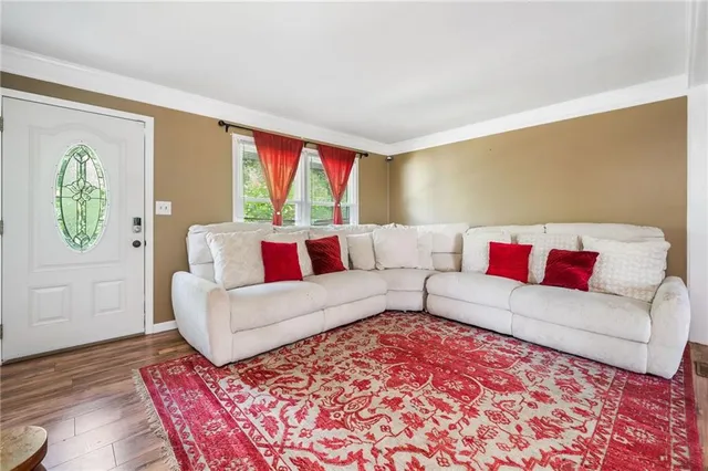a living room with a couch and a table