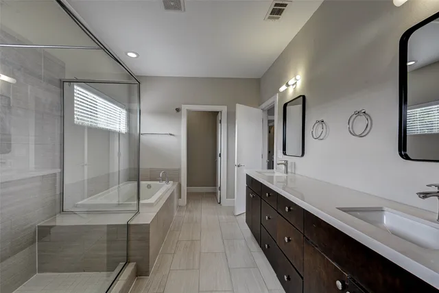 a view of a hallway view with wooden floor and staircase