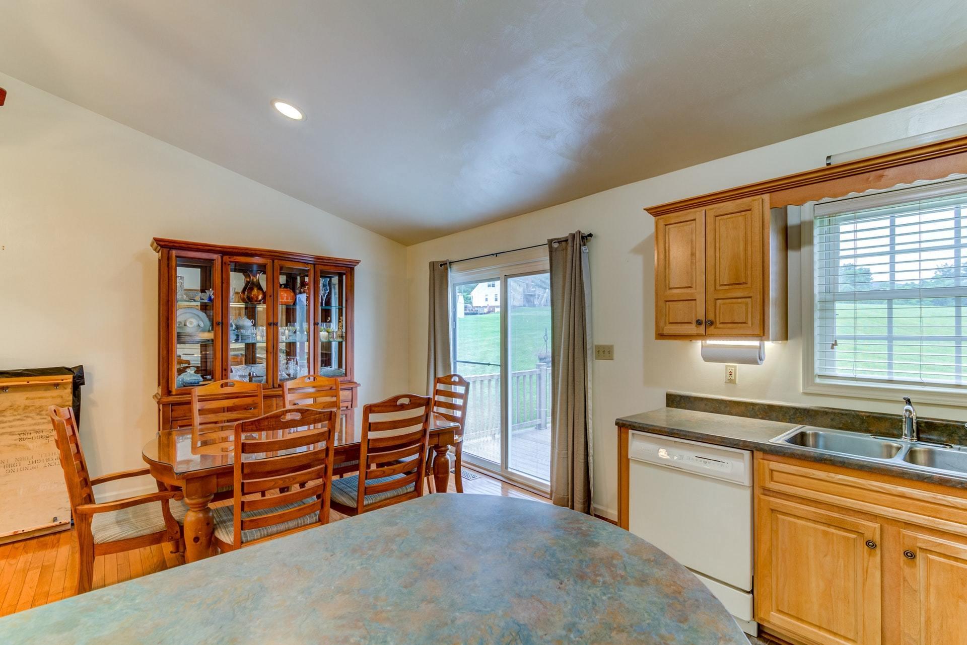 1632 Meadows Road Vinton, VA 24179 - Photo 11 of 47 a living room with furniture and large windows