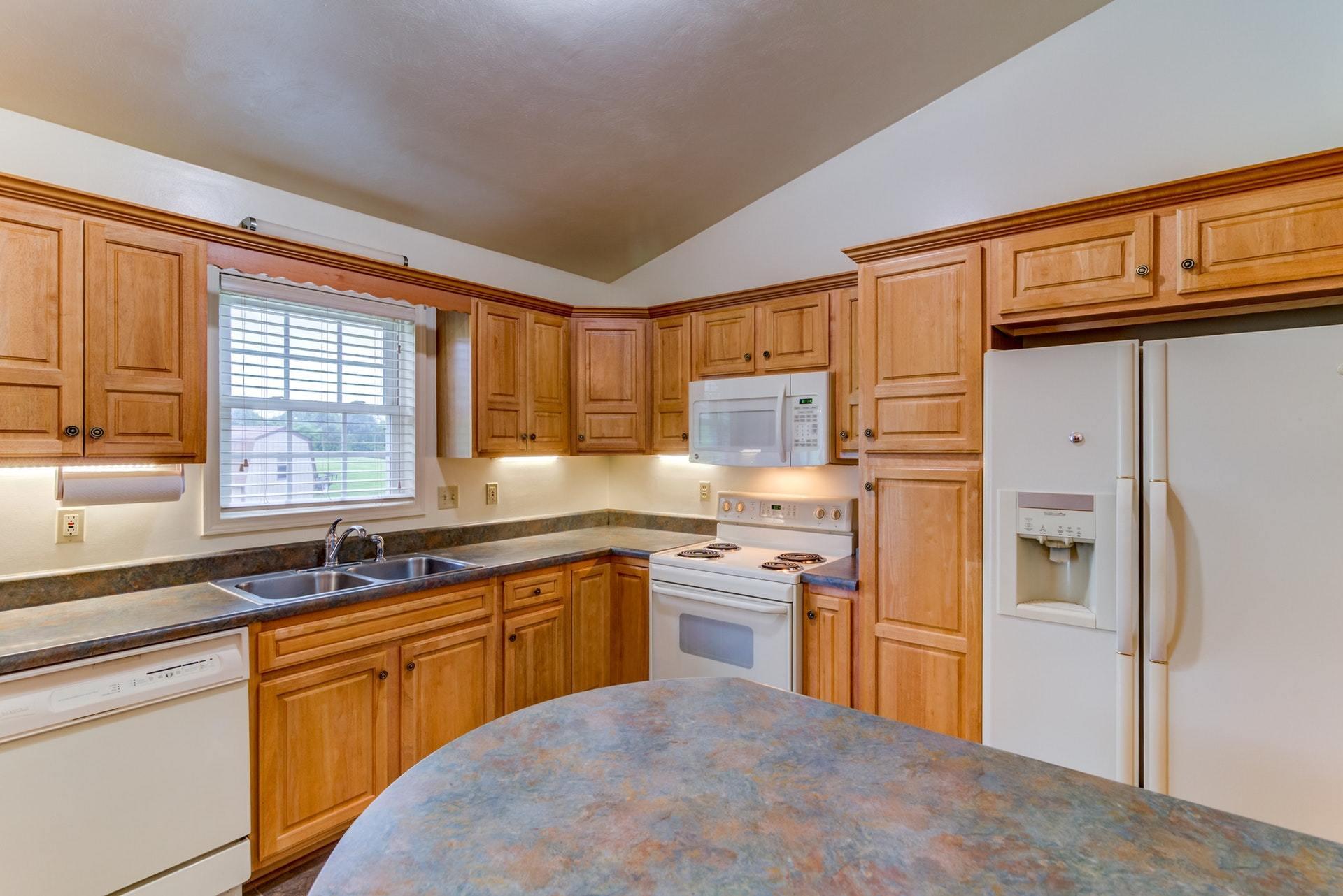1632 Meadows Road Vinton, VA 24179 - Photo 14 of 47 a kitchen with stainless steel appliances granite countertop a sink stove and refrigerator