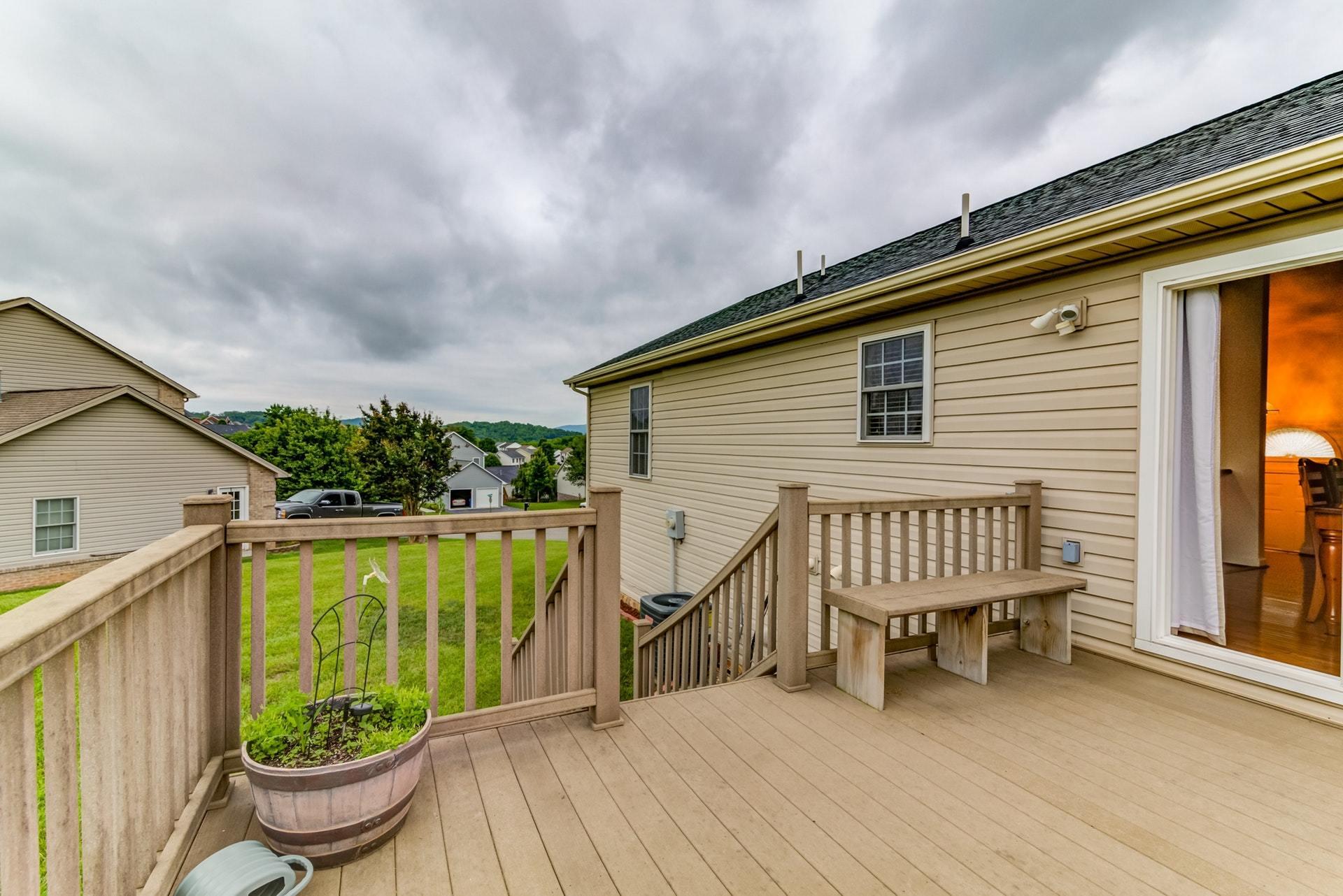 1632 Meadows Road Vinton, VA 24179 - Photo 17 of 47 a balcony with furniture and a potted plant