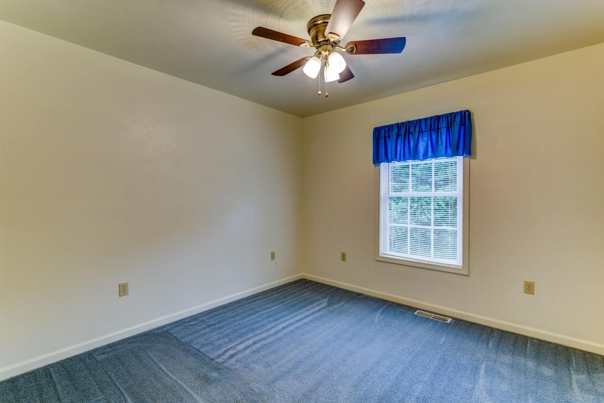 1632 Meadows Road Vinton, VA 24179 - Photo 19 of 47 an empty room with wooden floor and windows