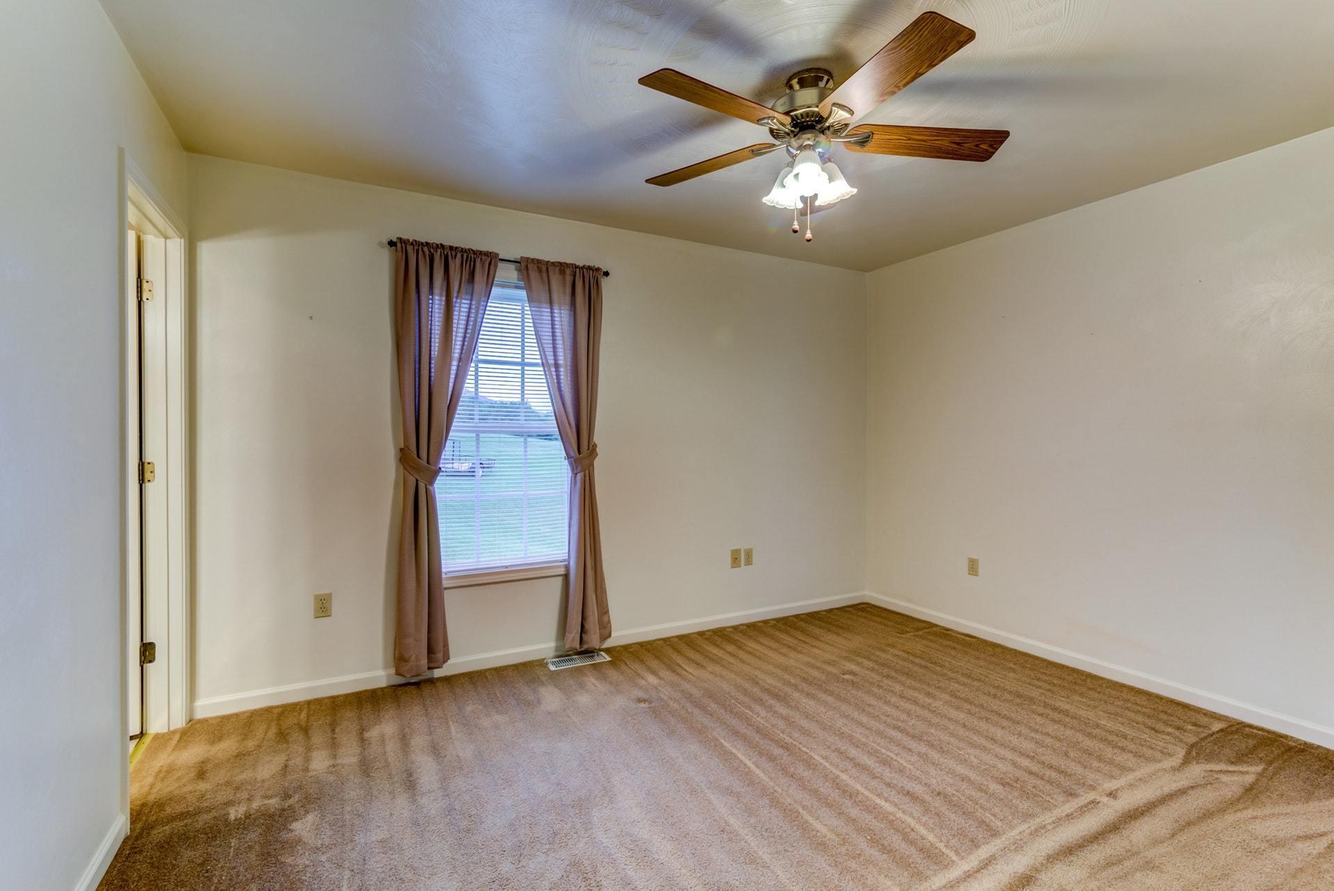 1632 Meadows Road Vinton, VA 24179 - Photo 20 of 47 wooden floor in an empty room with a window