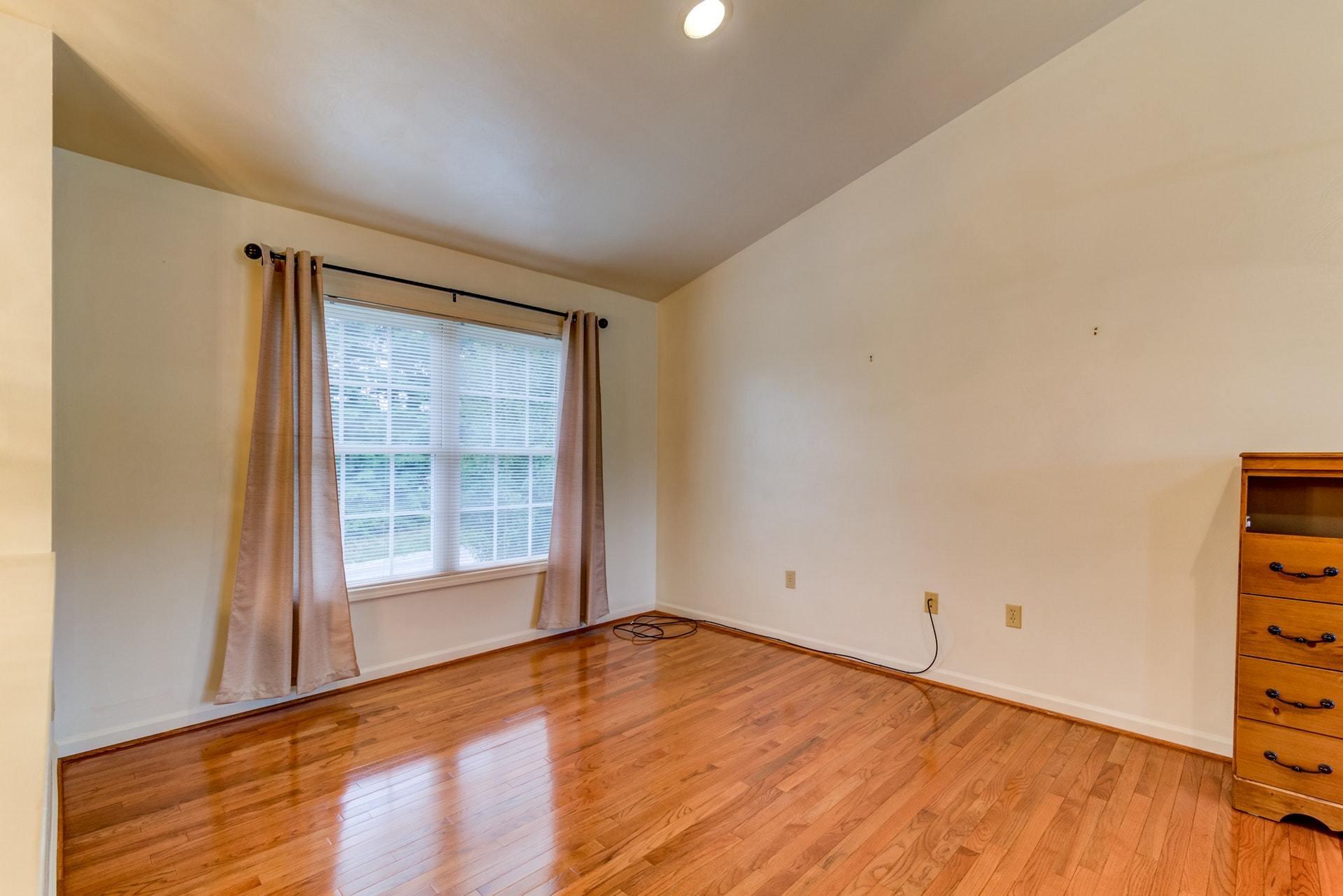 1632 Meadows Road Vinton, VA 24179 - Photo 3 of 47 an empty room with wooden floor and closet