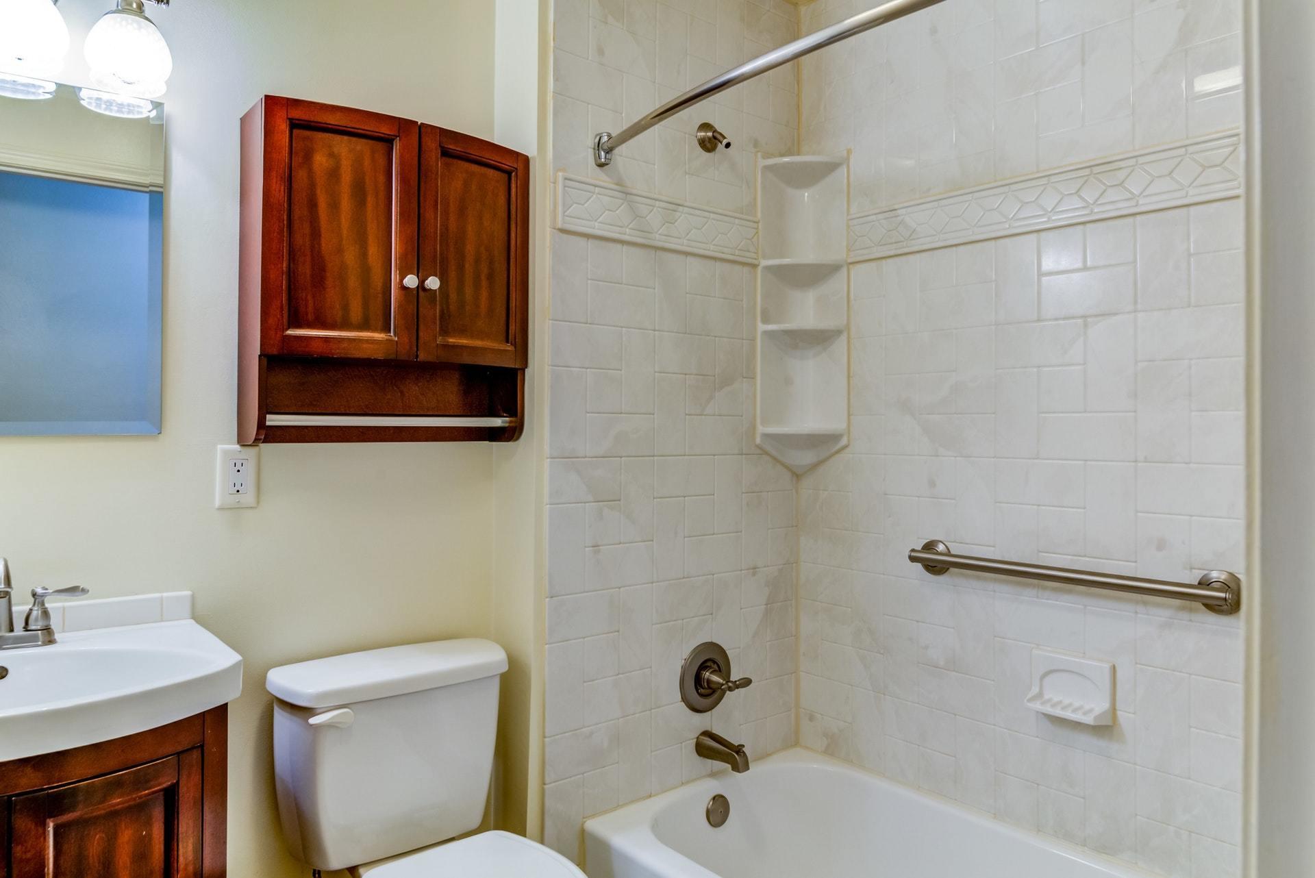 1632 Meadows Road Vinton, VA 24179 - Photo 23 of 47 a bathroom with a sink a toilet and shower