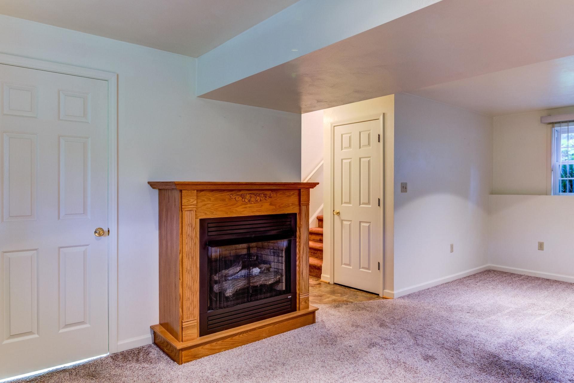 1632 Meadows Road Vinton, VA 24179 - Photo 26 of 47 a view of an empty room with window and fireplace