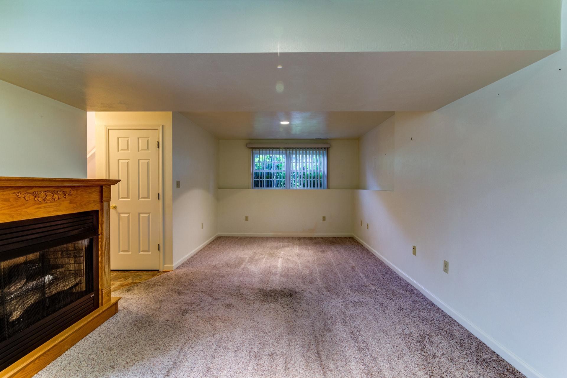 1632 Meadows Road Vinton, VA 24179 - Photo 29 of 47 an empty room with a fireplace and window