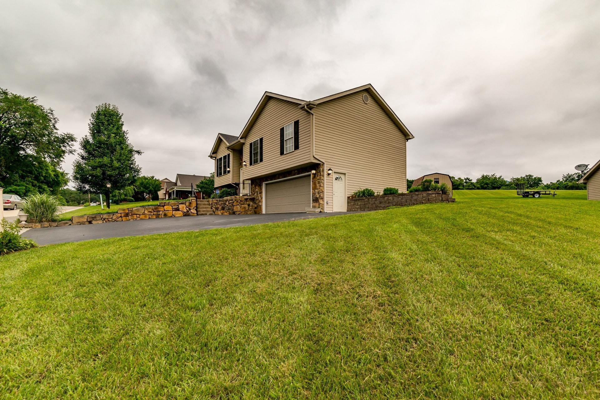 1632 Meadows Road Vinton, VA 24179 - Photo 35 of 47 a view of a big house with a big yard and large trees