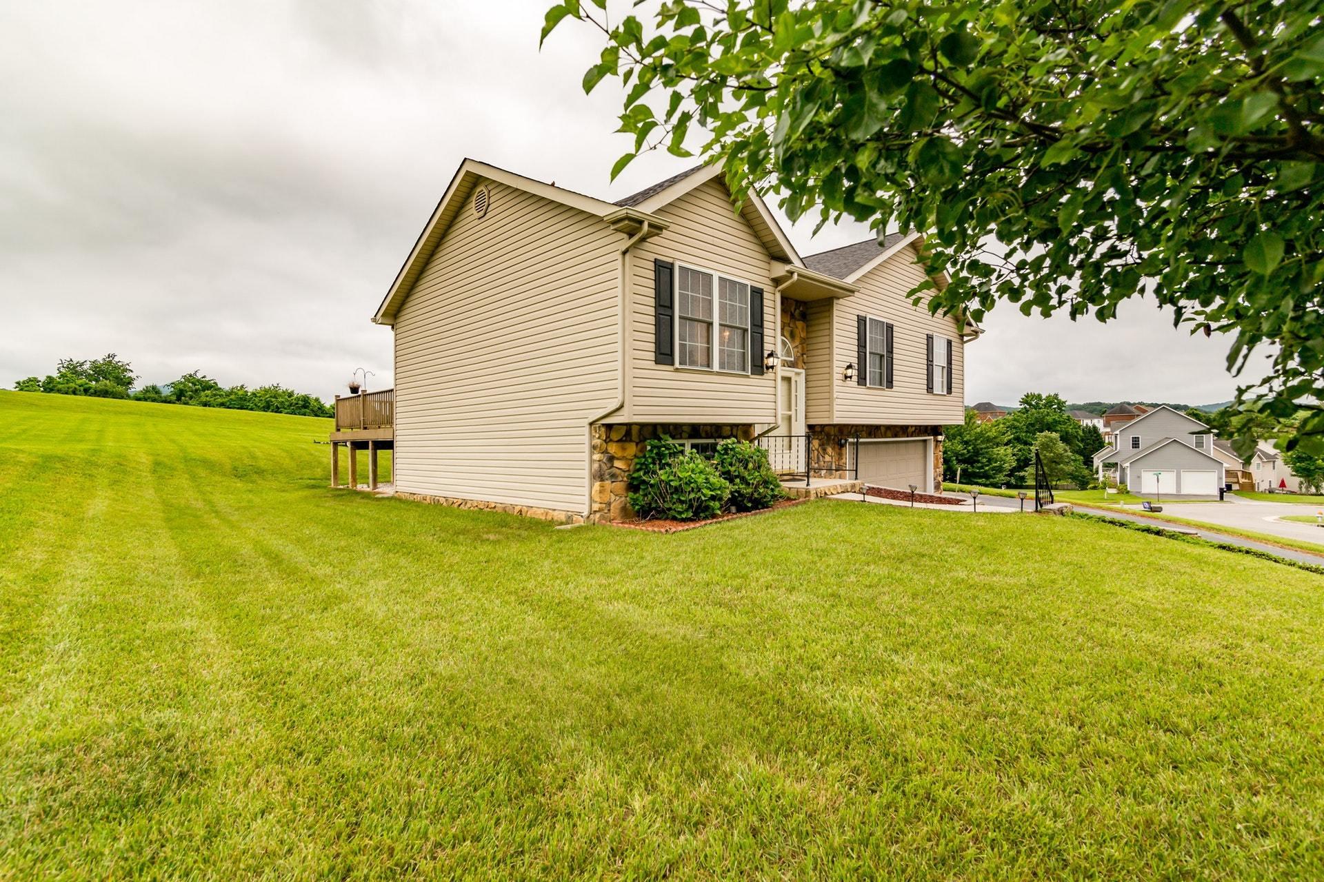 1632 Meadows Road Vinton, VA 24179 - Photo 37 of 47 a view of a house with a yard and a garden