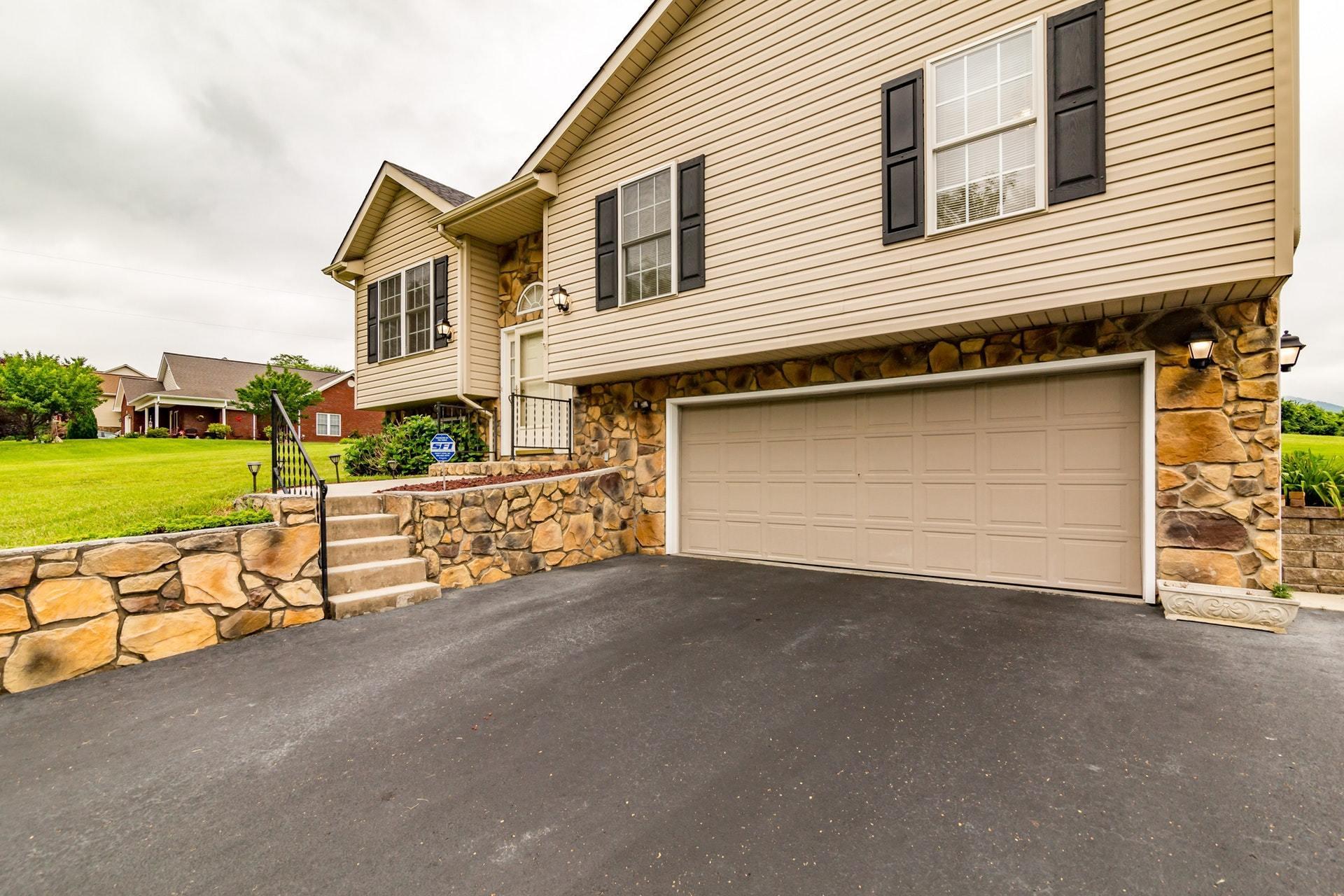 1632 Meadows Road Vinton, VA 24179 - Photo 45 of 47 a view of a house with a yard and garage
