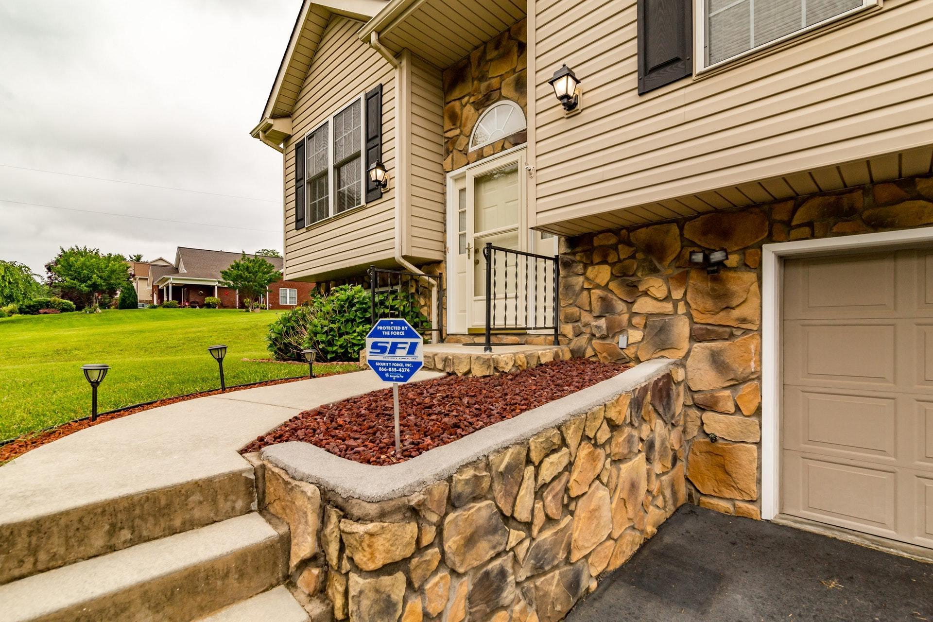 1632 Meadows Road Vinton, VA 24179 - Photo 46 of 47 a view of a house with a yard and sitting area