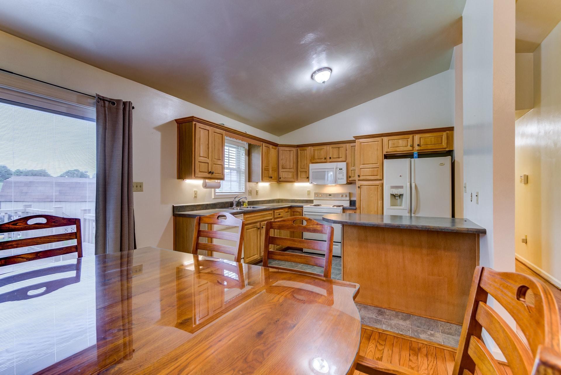 1632 Meadows Road Vinton, VA 24179 - Photo 6 of 47 a room with stainless steel appliances wooden floors and kitchen view