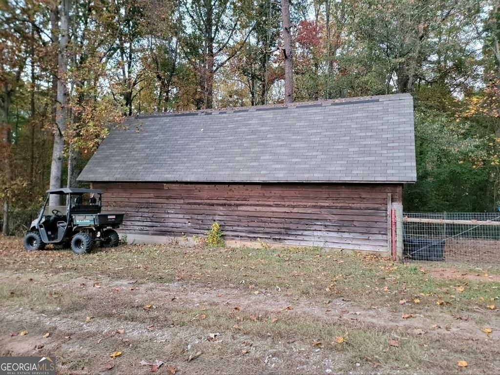 3720 McEver Road Oakwood, GA 30566 - Photo 33 of 73 a view of backyard with trees