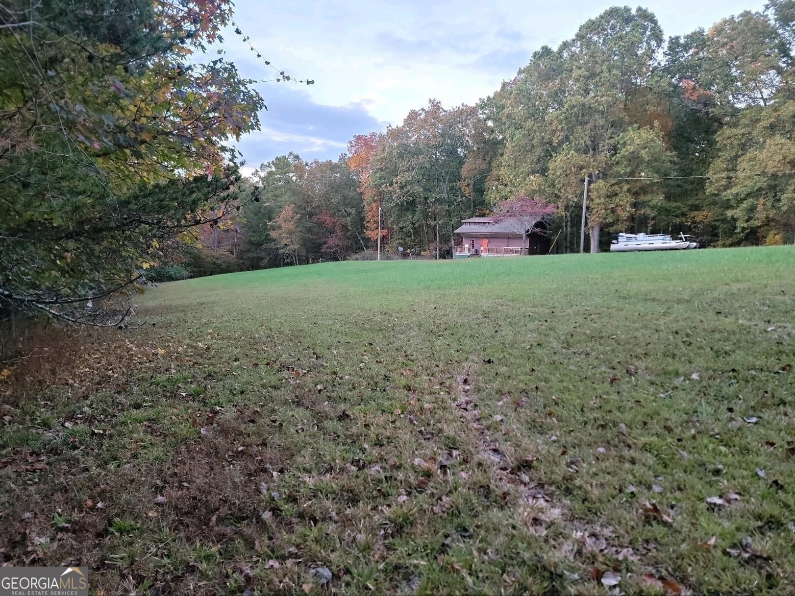 3720 McEver Road Oakwood, GA 30566 - Photo 44 of 73 a view of a yard with large trees
