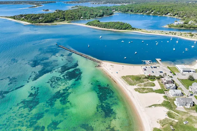 a view of a backyard with sitting area