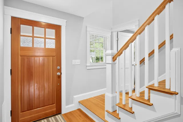 a kitchen with stainless steel appliances a sink and cabinets