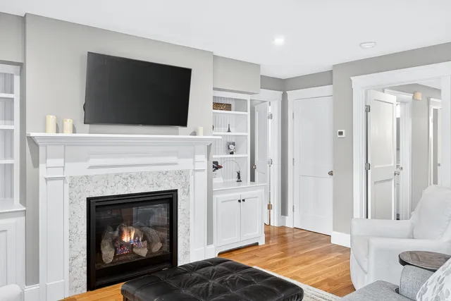 a kitchen with a stove and a white refrigerator
