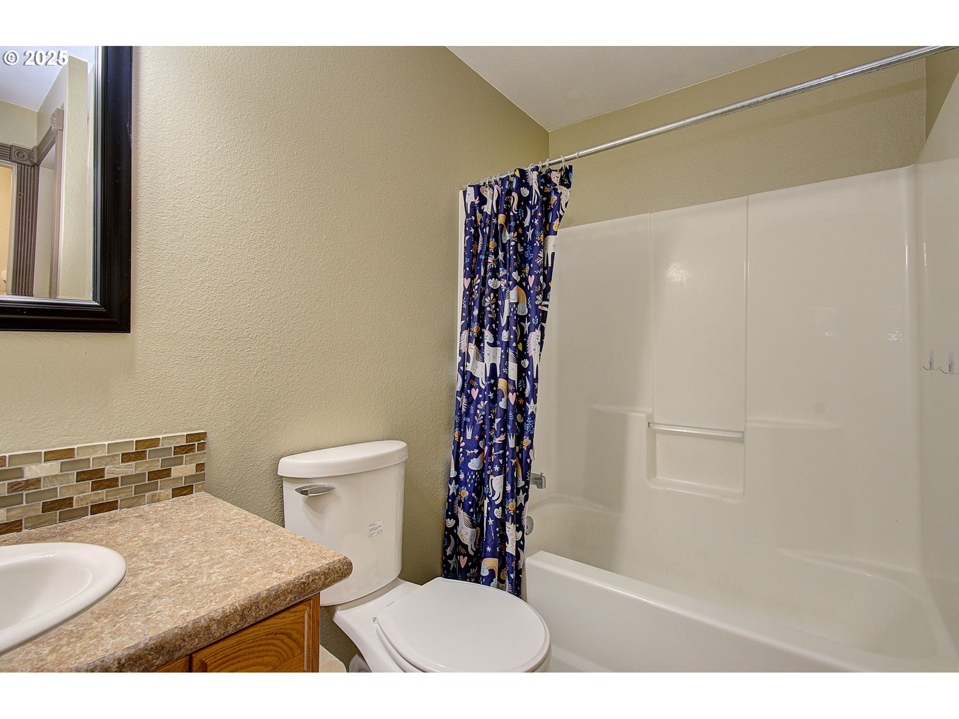 5305 Oriole Drive Longview, WA 98632 - Photo 19 of 32 a bathroom with a sink toilet and shower