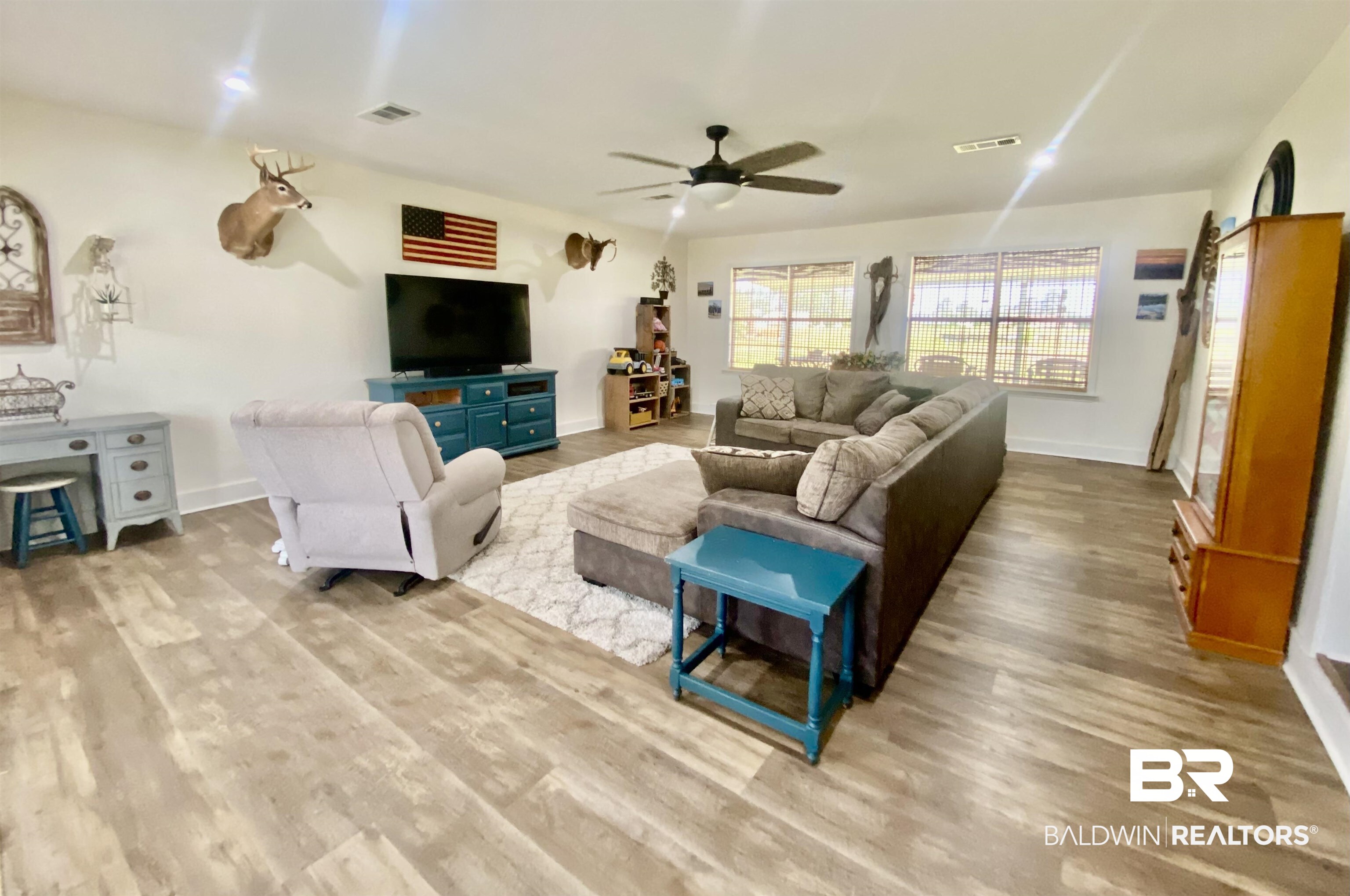531 Highway 136 Monroeville, AL 36460 - Photo 5 of 48 Living room with ceiling fan and light hardwood / wood-style floors