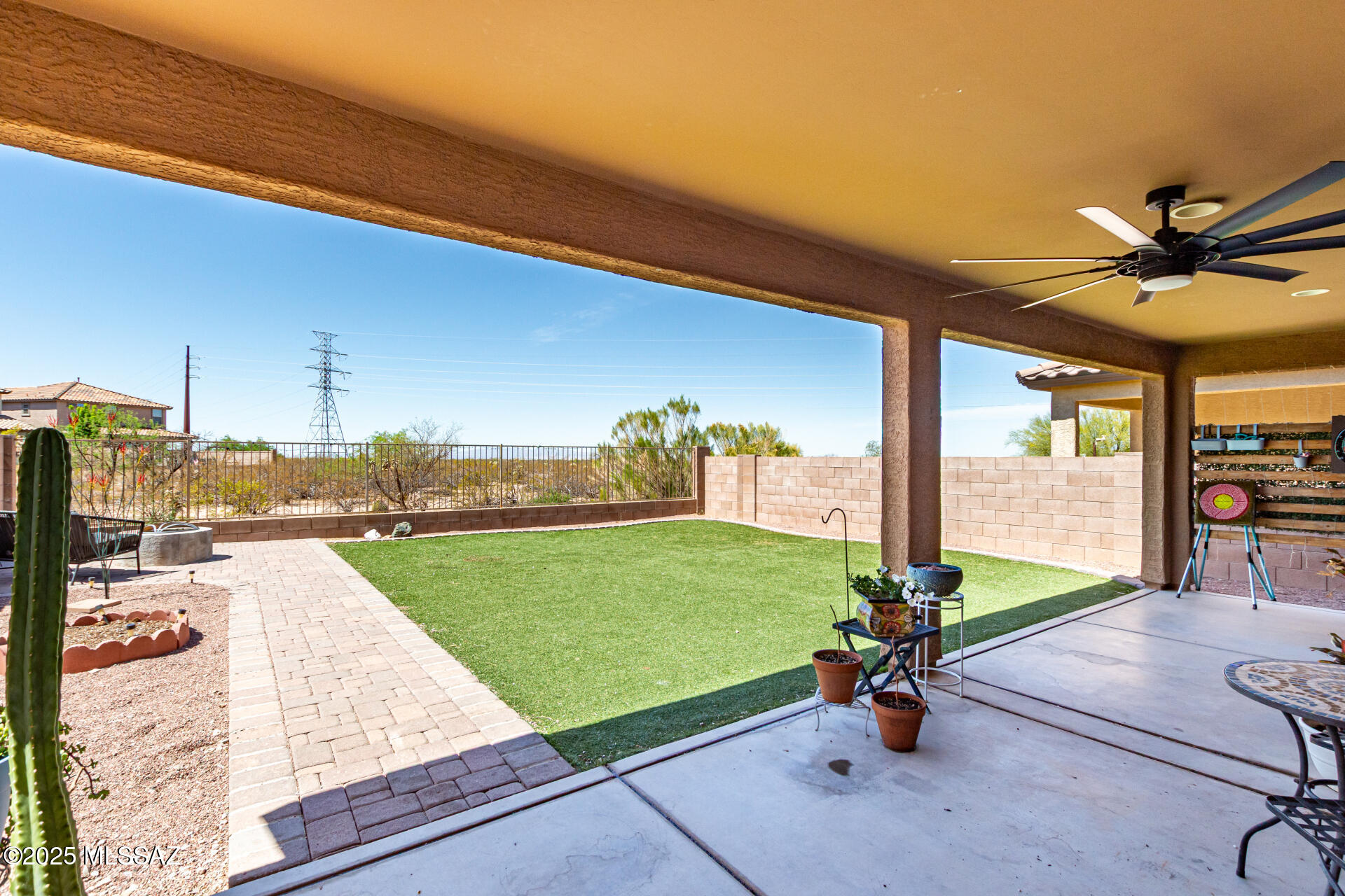9528 Desert Fauna Loop Tucson, AZ 85747 - Photo 38 of 46 a view of a swimming pool with a patio