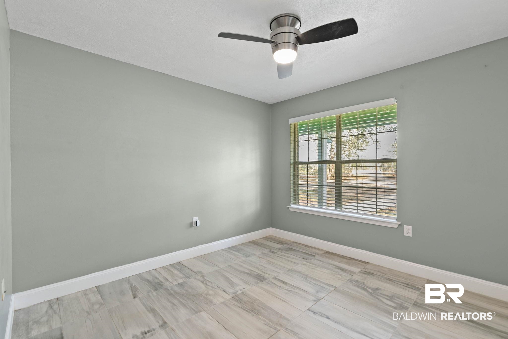 17366 Old Brady Road Bay Minette, AL 36507 - Photo 23 of 43 Unfurnished room featuring baseboards and a ceiling fan