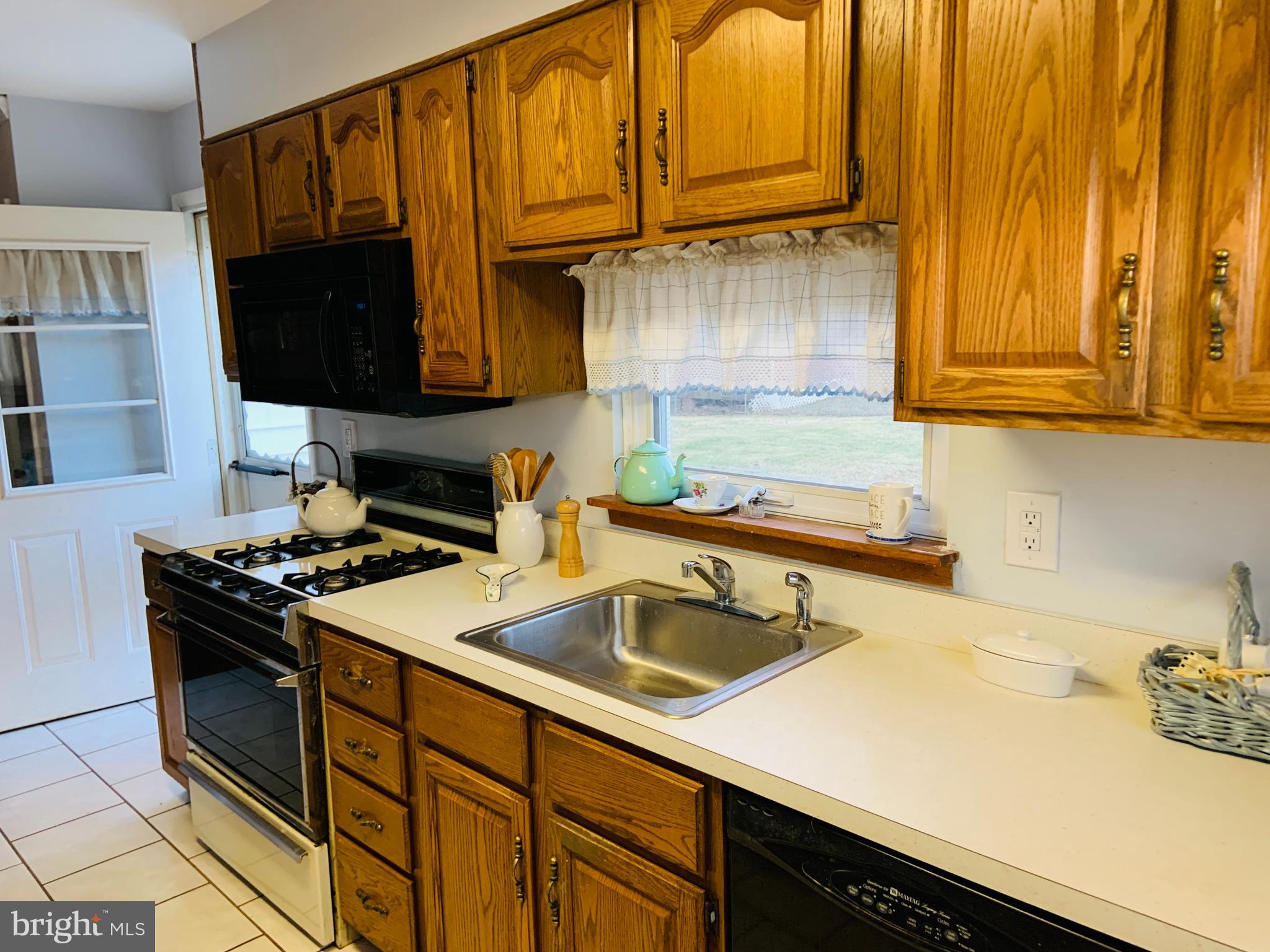 839 Phillips Road Warminster, PA 18974 - Photo 7 of 35 Door in Kitchen to outdoor patio