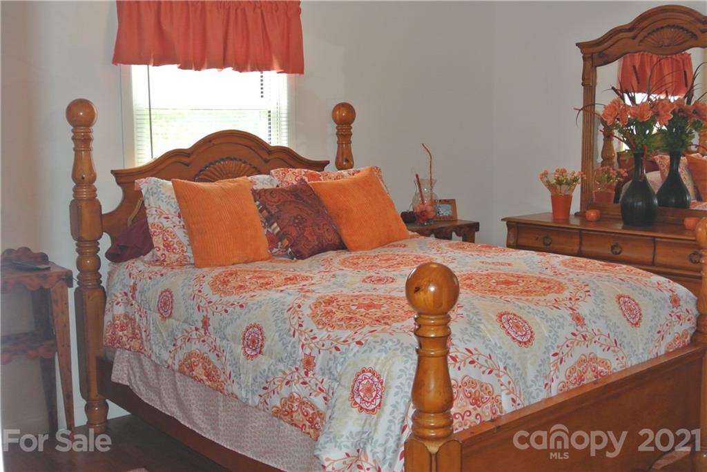 137 Cedar Lane Rutherfordton, NC 28139 - Photo 16 of 26 a bedroom with a bed and window