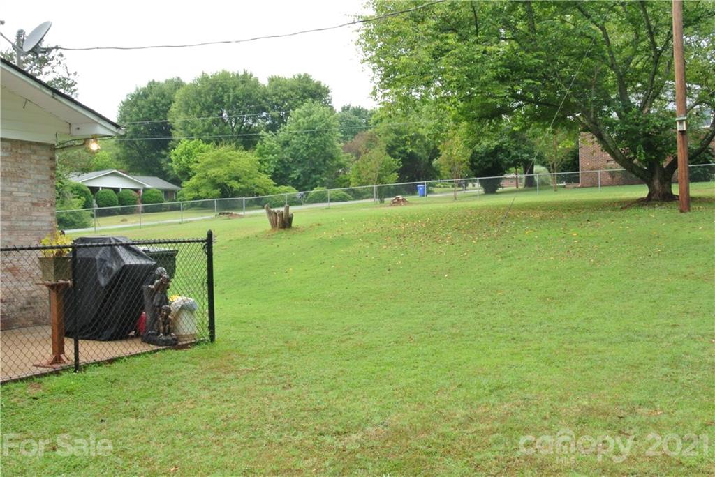 137 Cedar Lane Rutherfordton, NC 28139 - Photo 24 of 26 a view of a golf course with a lake