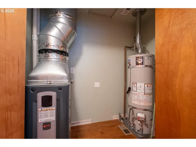 a bathroom with a sink toilet a mirror and vanity