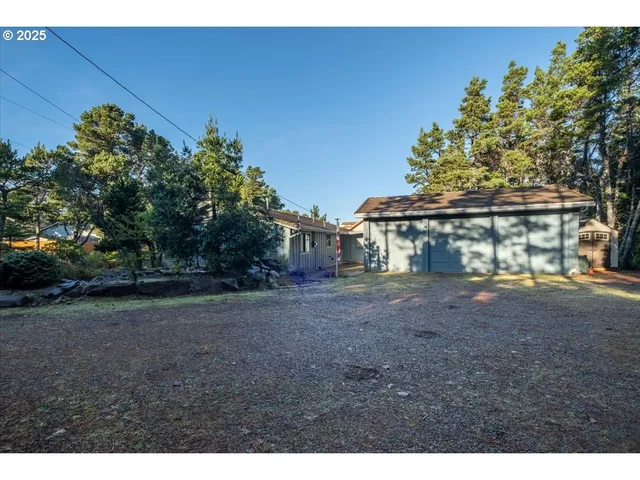 a view of a lake with lots of trees