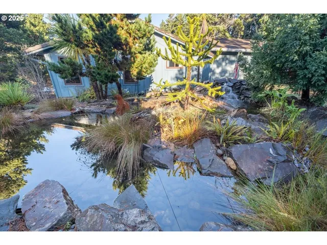 a backyard of a house with lots of green space