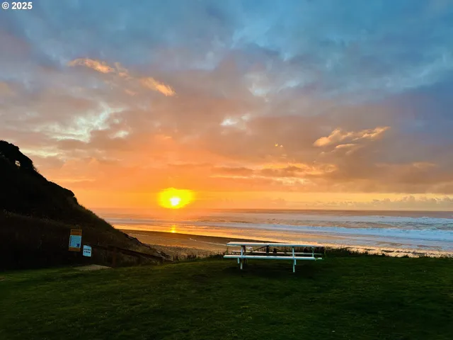 a living room with furniture and white walls