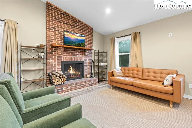 a bathroom with a sink mirror and vanity