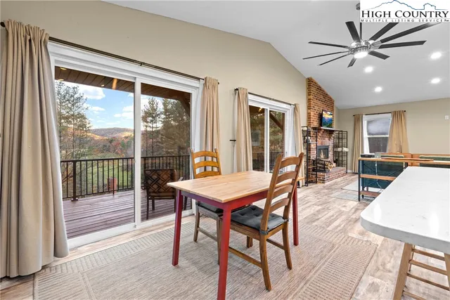 a bedroom with furniture and a flat screen tv