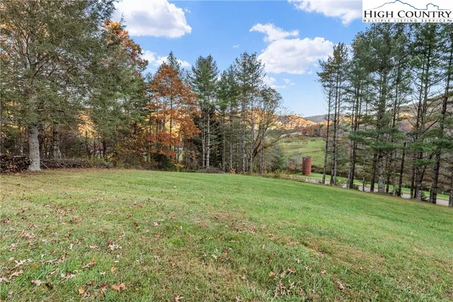a view of a house with a snow in the yard